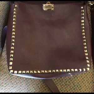 Burgundy studded purple bag